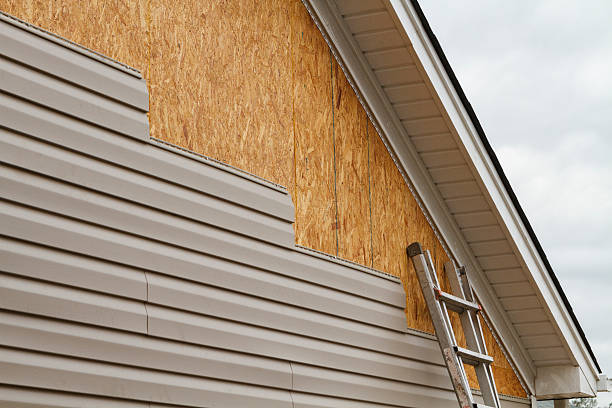 Professional Emergency Siding Repair technician working in Newbury, OH